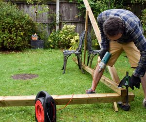 Garden Fun - new swing for the back garden - dad at work