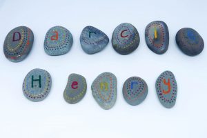 painted pebbles - spelled out names