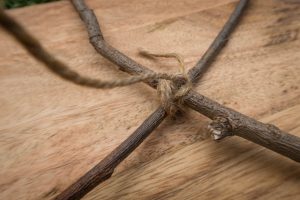 tie twigs together using string