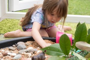 Tuff Tray Ideas - Dino World - what she thinks