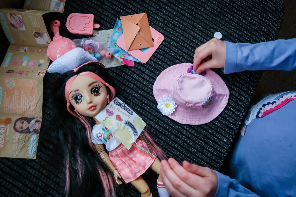 getting creative by customising her B-Kind hat