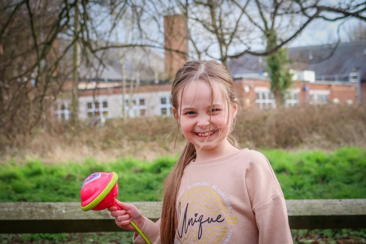 A proud smile when she finally cracked how to use Jump It.