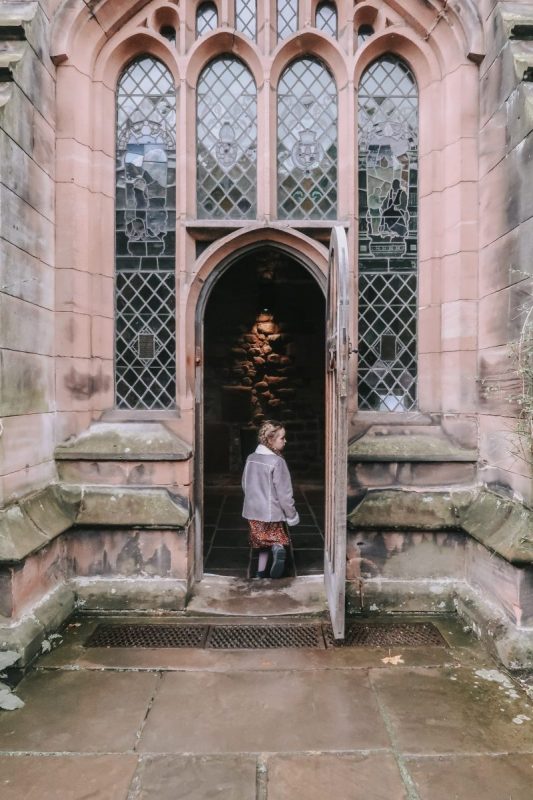 Through a doorway - street photography in Chester