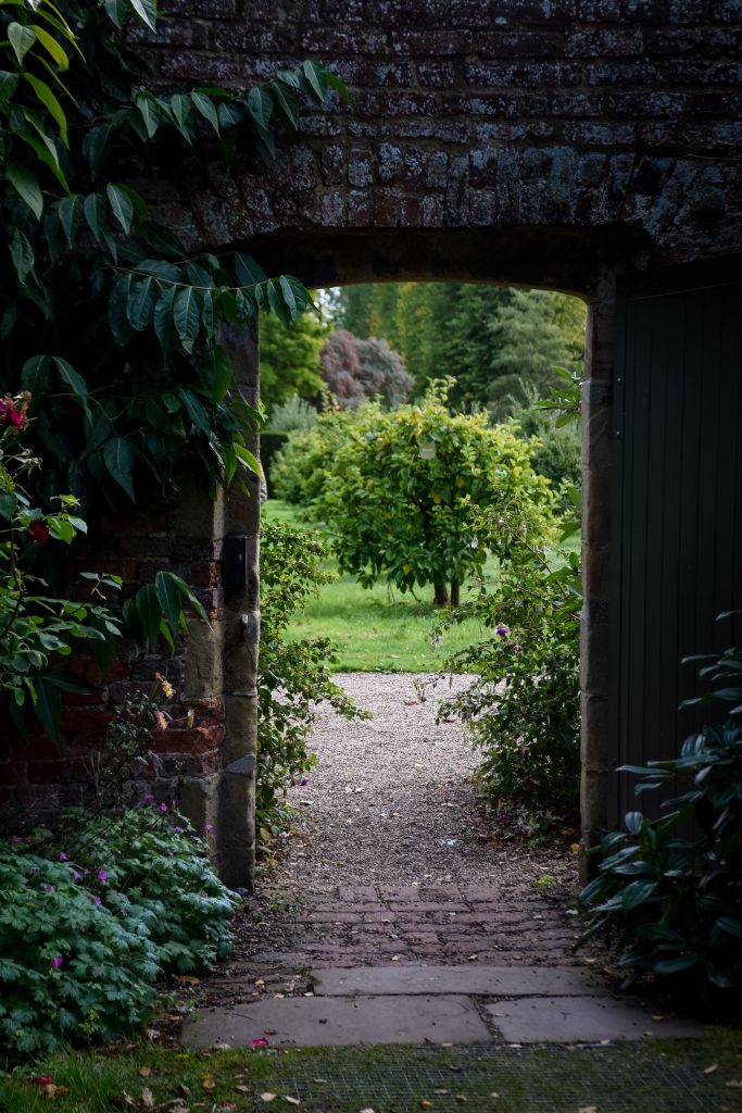 Looking through a doorway into the gardens at Erddig