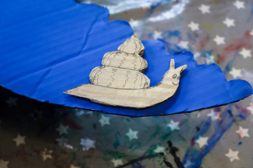 Add in a little snail to your whale costume tail